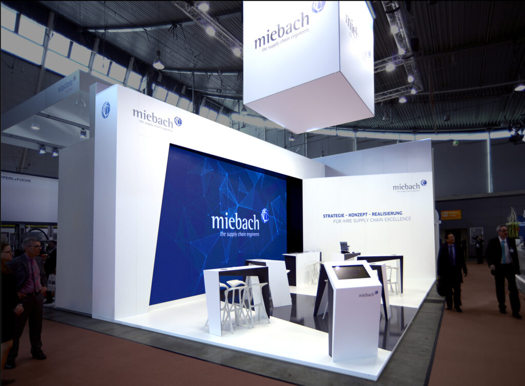 Messestand Miebach Consulting - Stand auf der LogiMat mit großem LED Display in Stuttgart