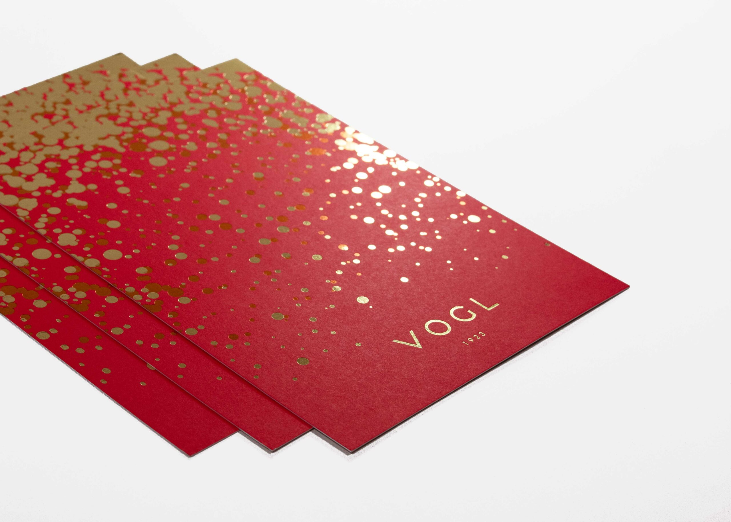 Print Design mit Heißfolienprägung aus Gold und Kupferfolie der Karte für Juwelier Vogl